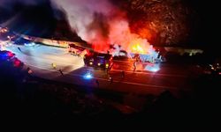 Isınan tekerlek balatalarından çıkan alevler sunta yüklü tırı yaktı