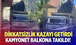 Dikkatsizlik kazayı getirdi: Kamyonet balkona takıldı!