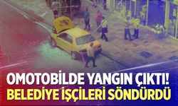 Otomobilde çıkan yangını belediye temizlik işçileri söndürdü
