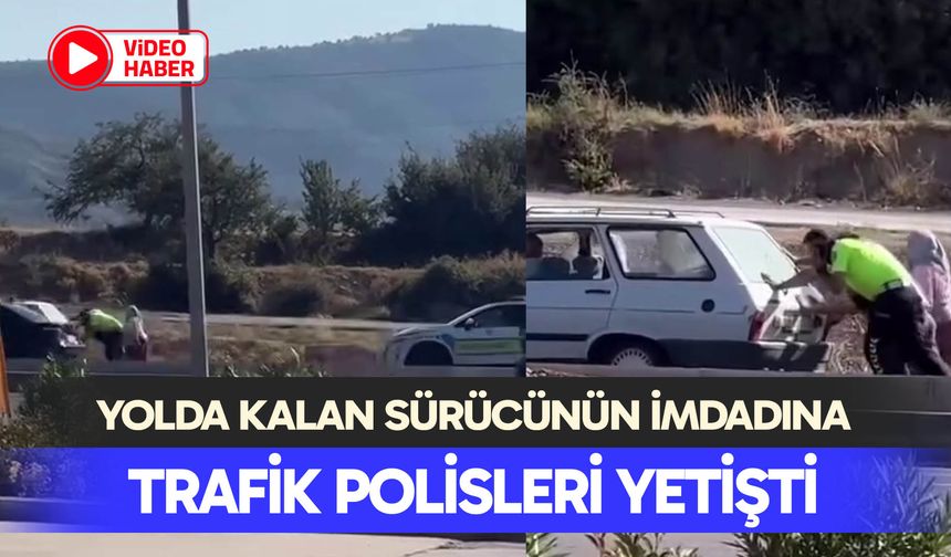 Yolda kalan sürücünün imdadına trafik polisleri yetişti