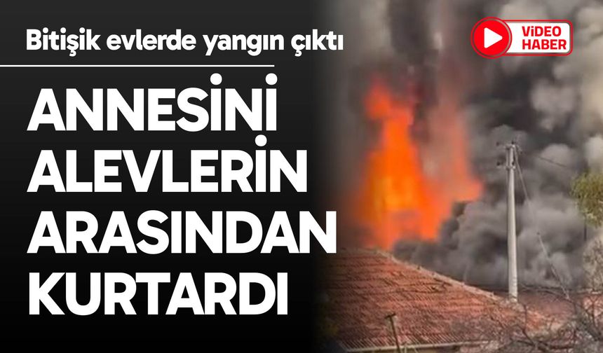 Annesini alevlerin arasından kurtardı